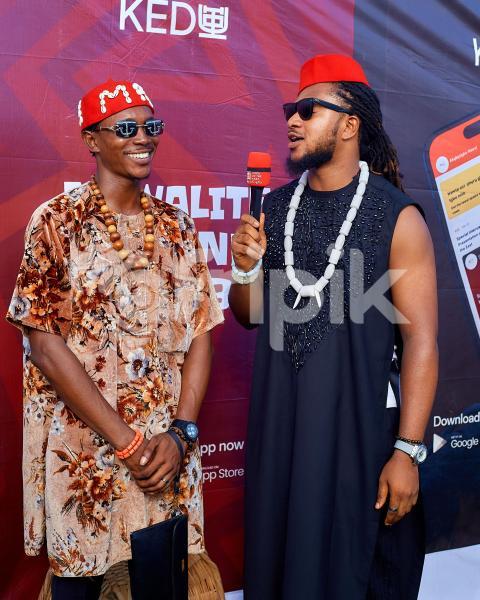 Two boys in traditional attire