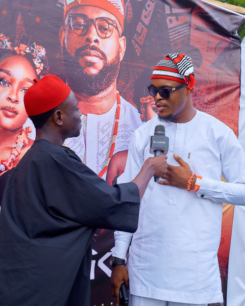 Boys in cultural attire talking