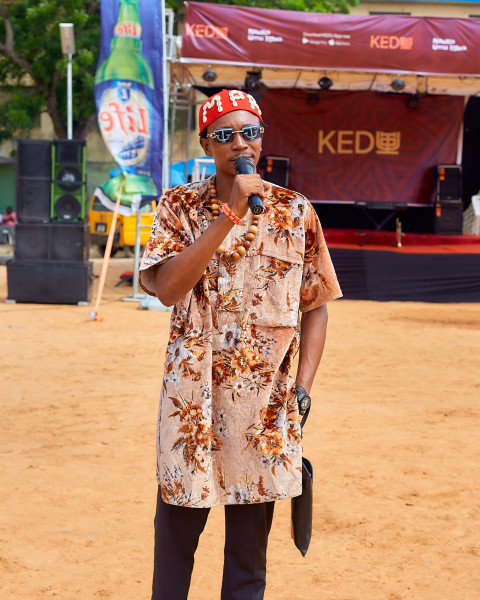 Boy wearing cultural attire talking 1