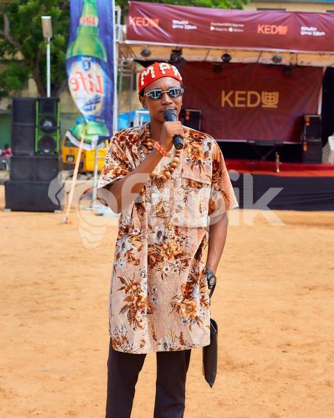 Boy wearing cultural attire talking 1
