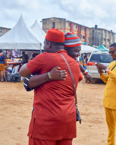 Two men embracing each other