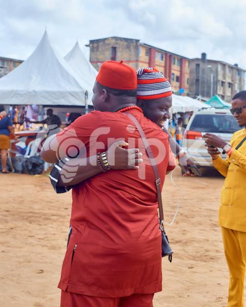 Two men embracing each other