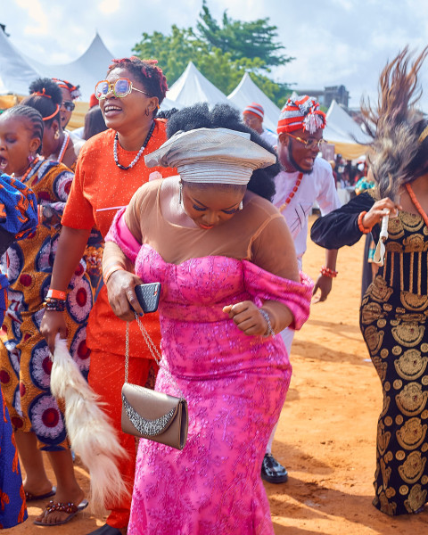 A lady dancing in traditional attire