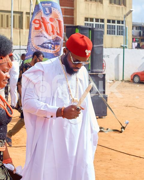 A boy wearing a kaftan