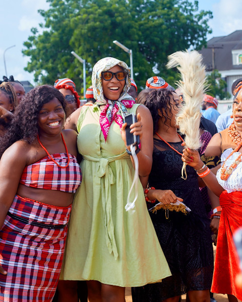 Ladies cheering at a cultural event 1