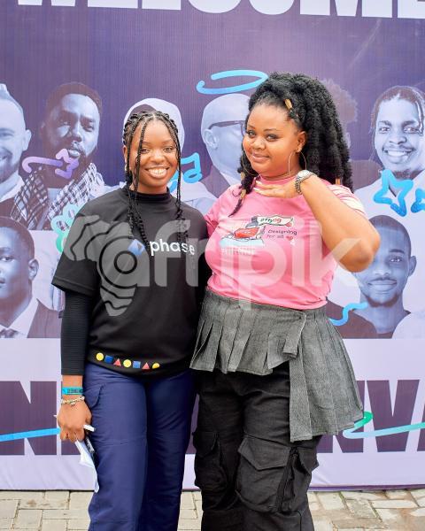 Two ladies posing at UDC 2024