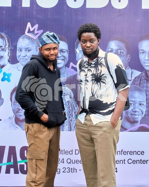 Two guys posing at UDC 2024