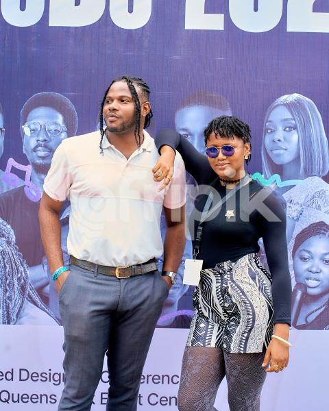 Boy and girl posing at UDC 2024