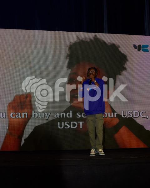 Boy talking on a stage