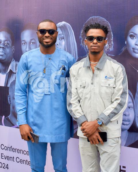 Two boys posing for a photo shoot