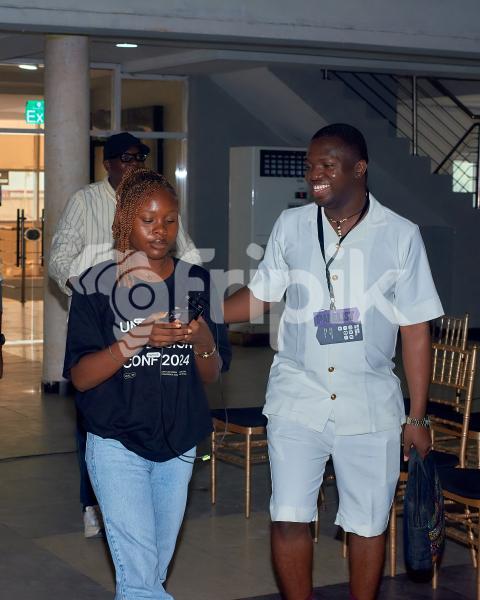 Two attendees at UDC 2024