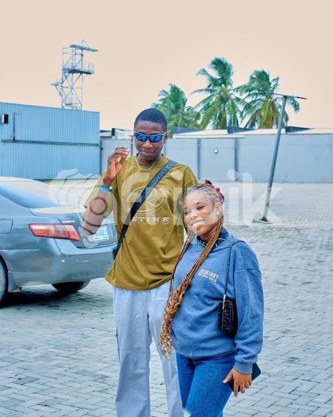 A girl and a boy outdoors