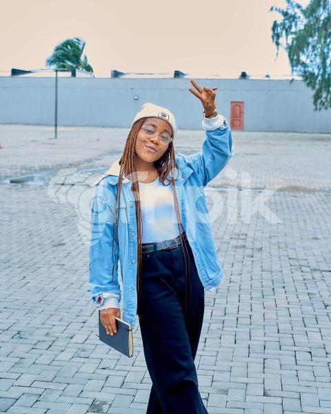 A beautiful girl on blue jacket