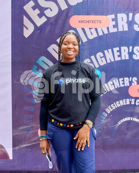 Attendee taking photo at photo booth 2