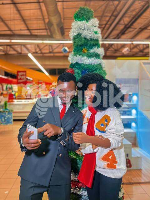 Boy and girl looking at a phone