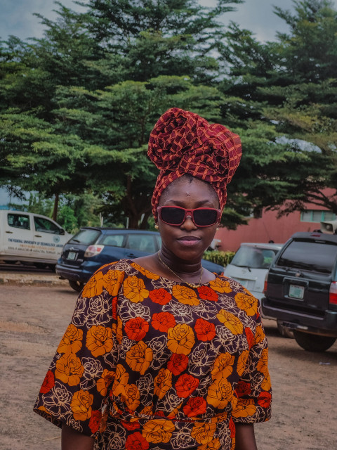 African girl posing with glasses on