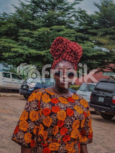 African girl posing with glasses on
