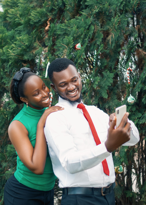 Girl and boy looking at a phone