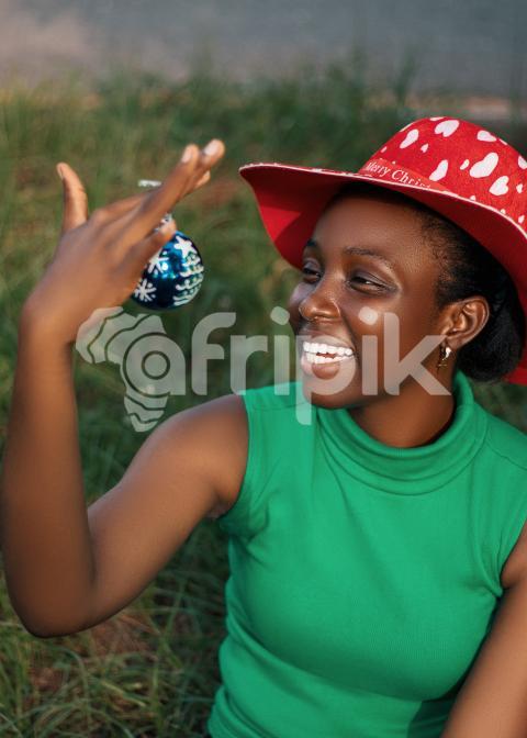 Girl looking at a christmas ball