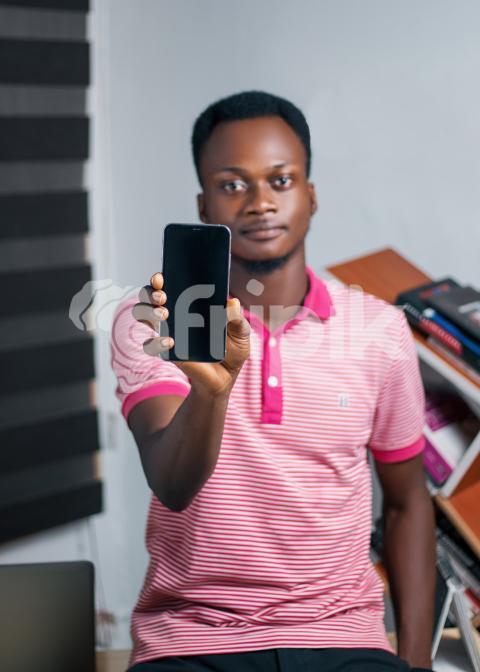 Boy facing with phone screen front