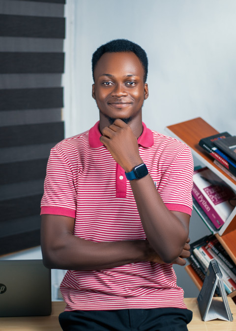 Boy posing in an office