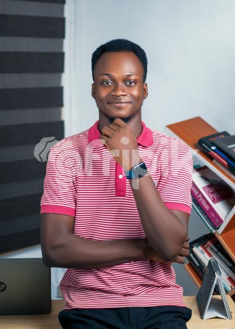 Boy posing in an office