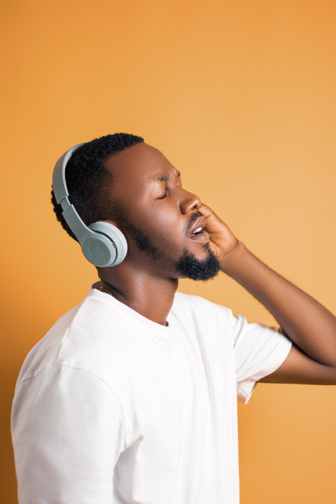 Man listening to music on headphone