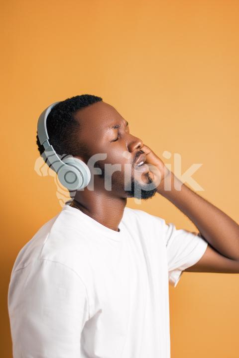 Man listening to music on headphone