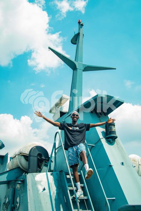 Excited guy on a war ship