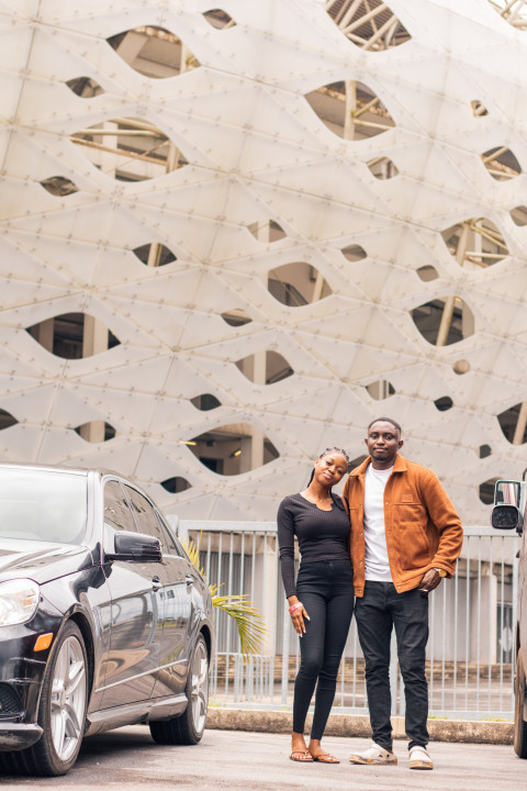 Boy and girl in front of Akwa ibom Stadium