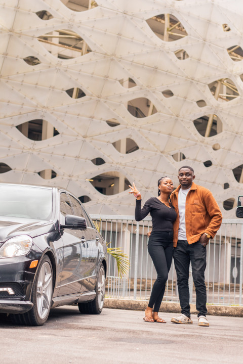 girl and boy in front of Stadium