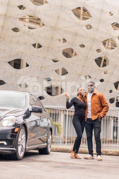 girl and boy in front of Stadium