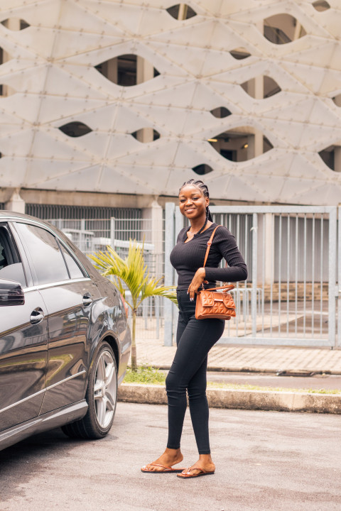 Girl with bag standing