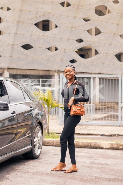 Girl with bag standing