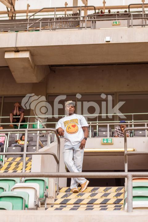 Boy standing in the stadium
