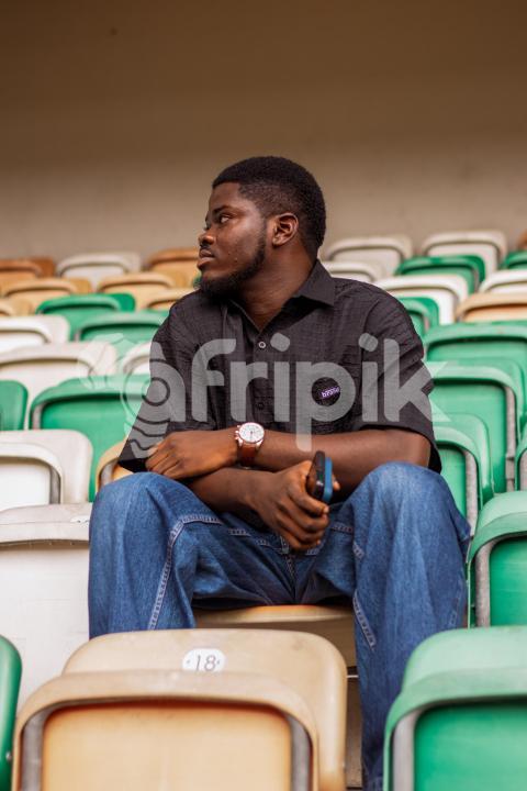 Boy sitting on chair