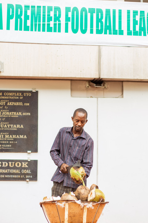 Man cutting coconut 1