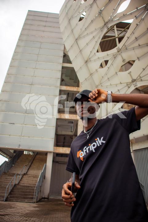 Boy in front of stadium 4