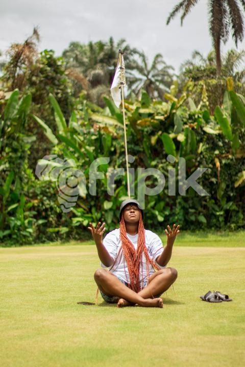 Girl sitting on grass