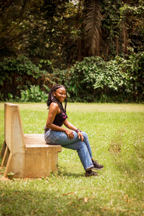 Cute girl sitting on bench