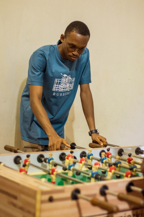 Boy playing foosball