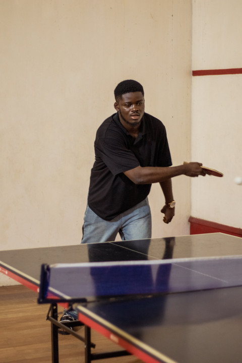 Boy playing table tennis