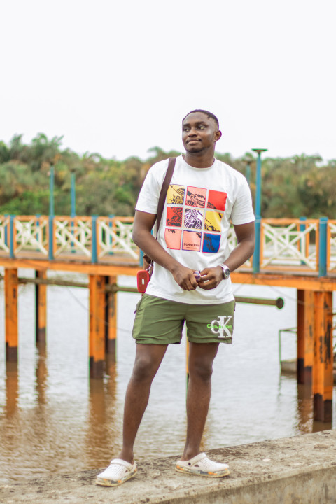 Boy standing at the bay 2