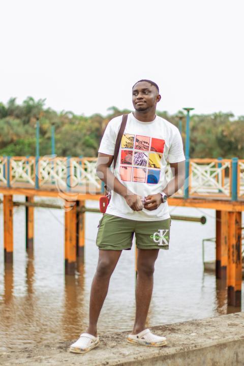 Boy standing at the bay 2