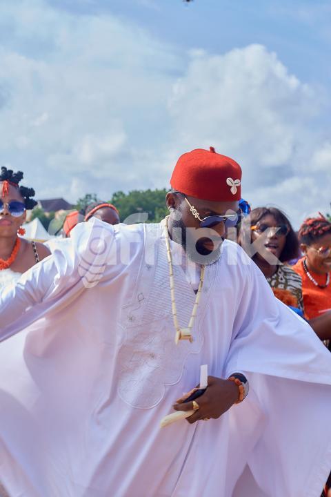 Boy wearing a white traditional outfit 1