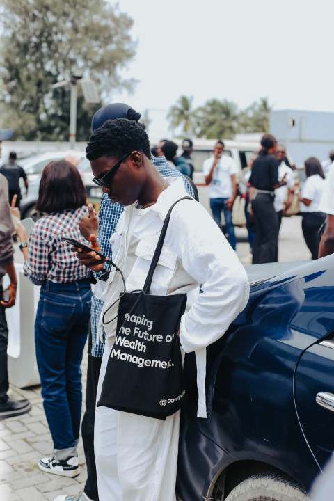 Attendee pressing his phone at UDC 2024