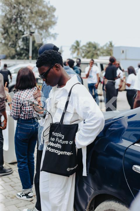 Attendee pressing his phone at UDC 2024