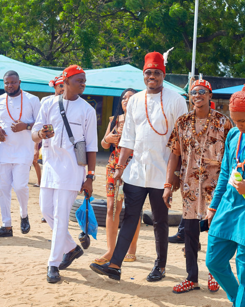 Men wearing traditional outfits walking