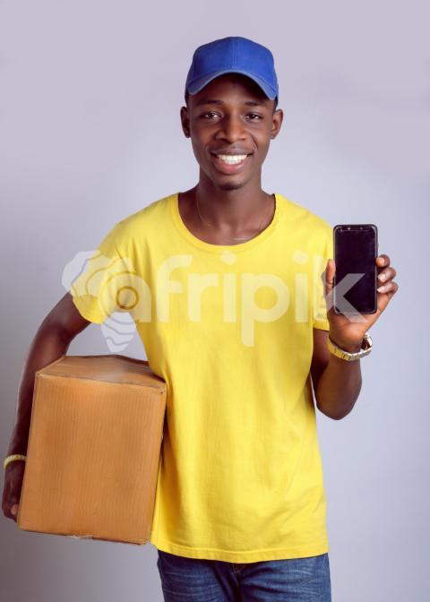 Delivery man with a mobile pone